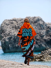 Blue Spirit women’s beach poncho towel with hood, zipper and pockets – CACAO Beachwear™